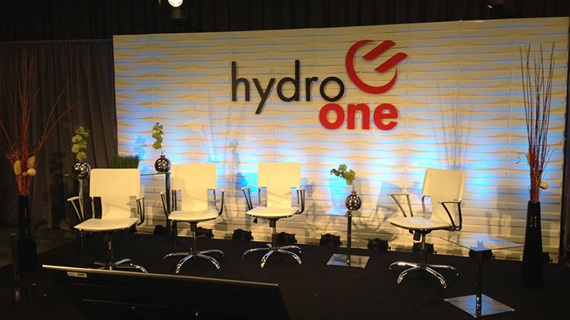 Corporate stage production with projection backdrop